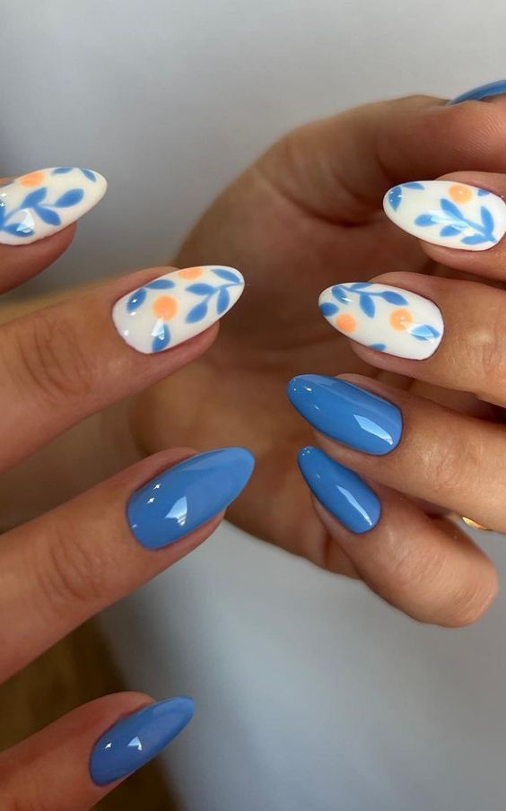 summer nail ideas - blue and orange floral design
