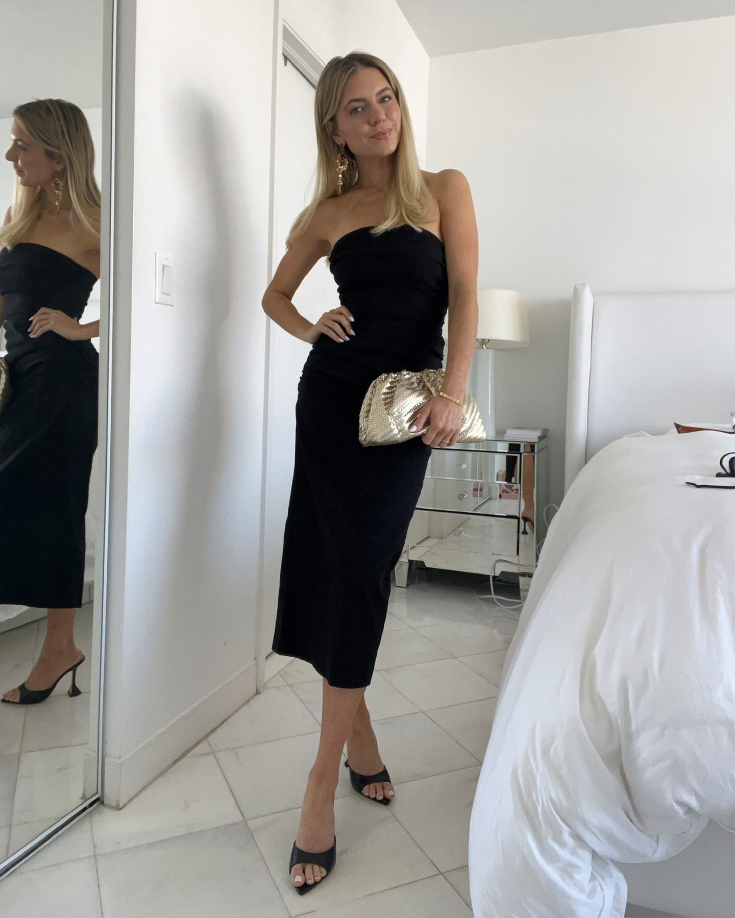 strapless black midi dress strapless black midi dress with black heels and gold clutch | What to Wear to a Summer Wedding
