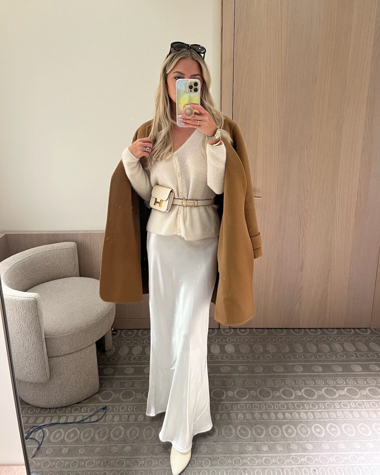 button up cardigan with a white slip skirt and heels