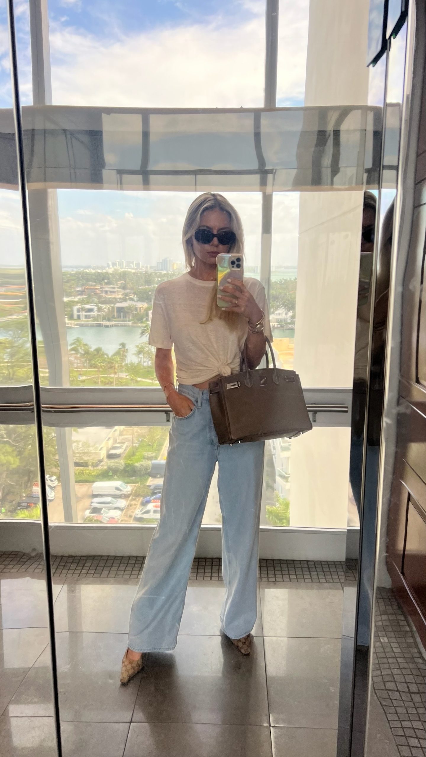 basic white t-shirt with denim and heels