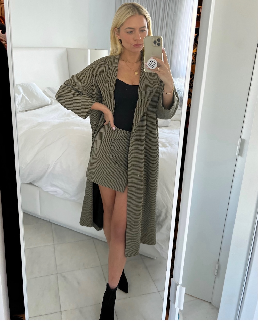 mini skirt and matching coat mini skirt and matching coat with a black bodysuit and black booties