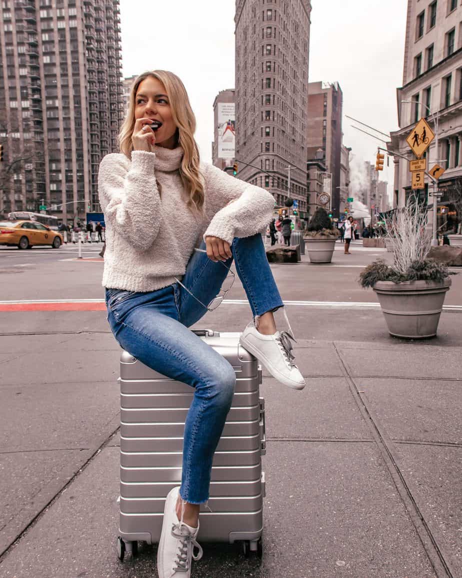 white sneaker outfits white sneaker outfit with blue jeans and a turtleneck sweater