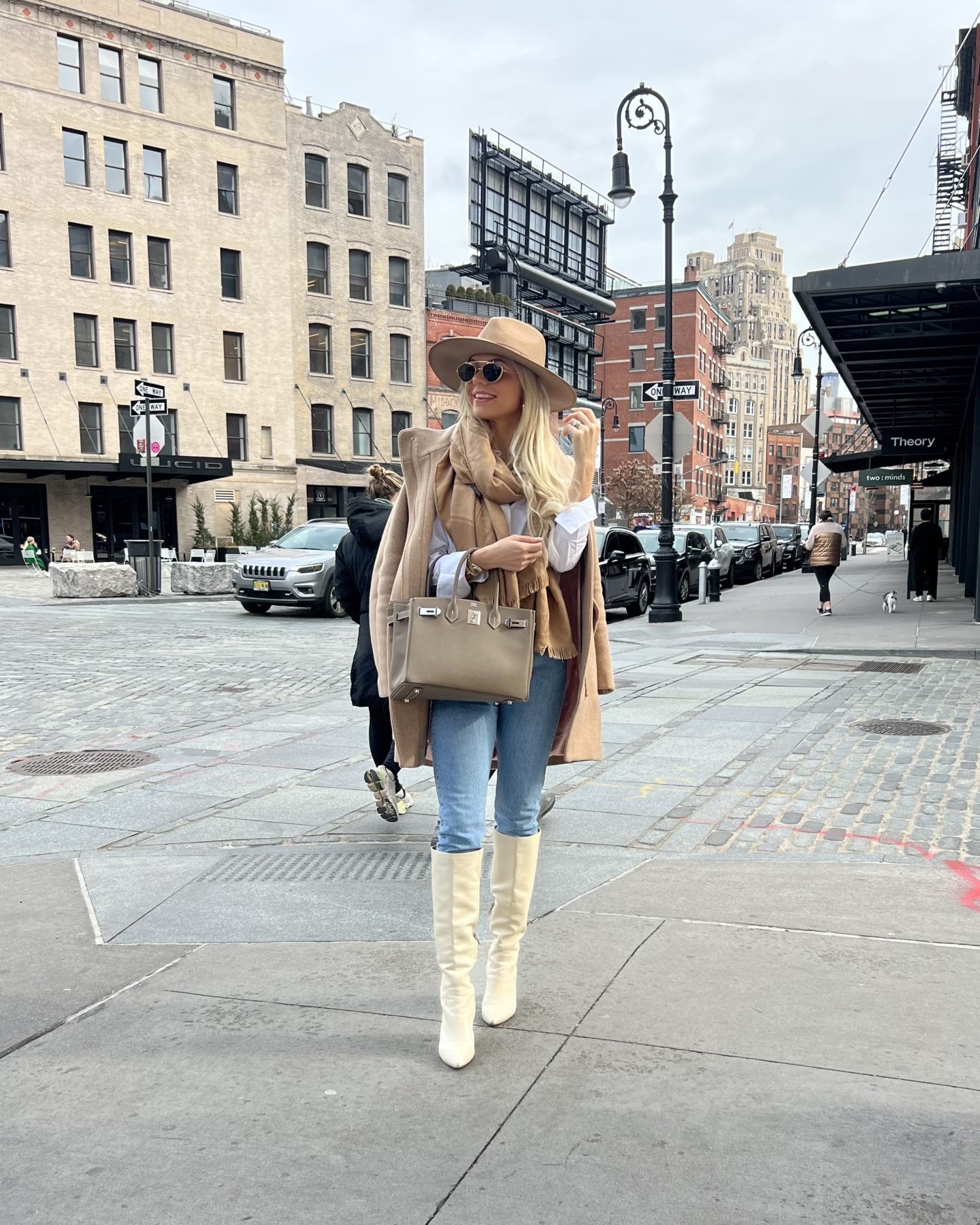 jeans with a coat and knee high boots