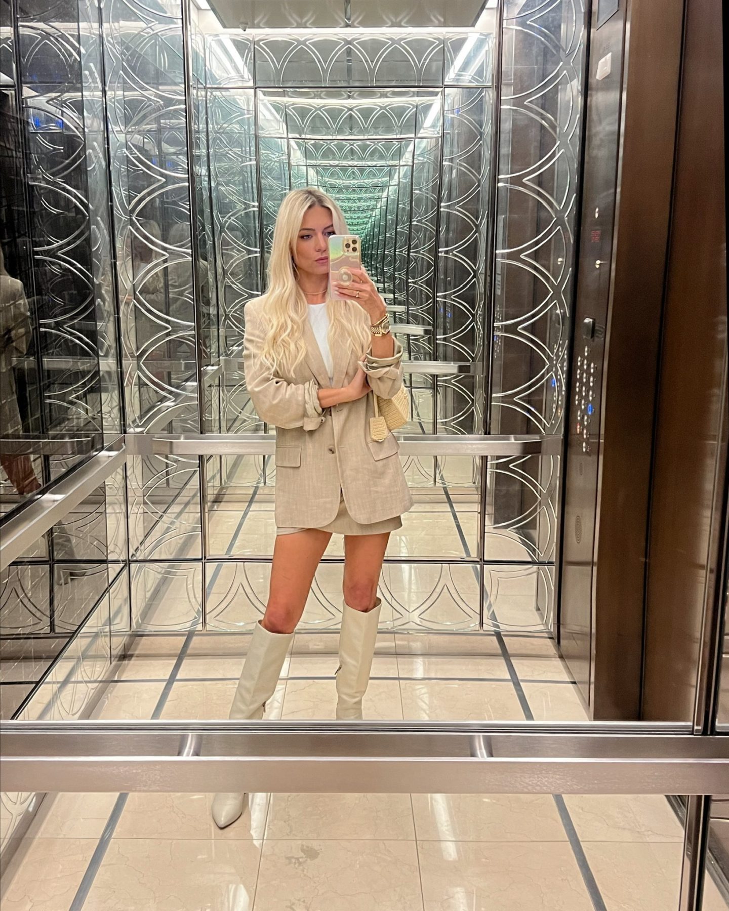 mini skirt with matching blazer and knee high boots