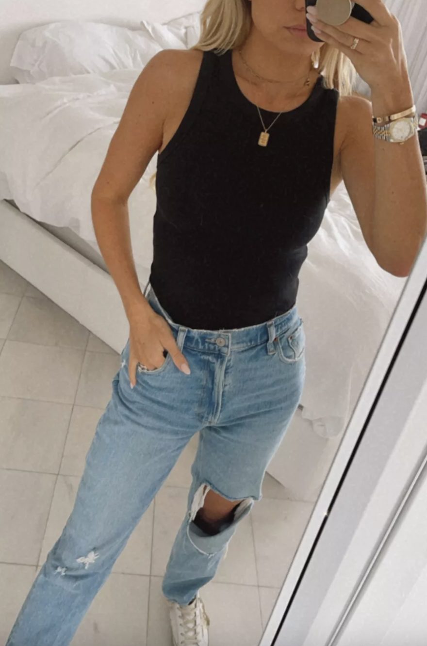 Airport Outfits for Summer jeans, a black tank, and white sneaker outfit