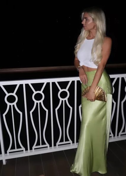 green silk maxi skirt with white tank top