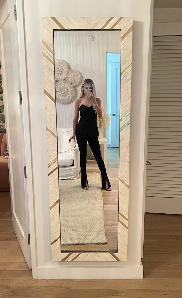 strapless top with black flared leggings