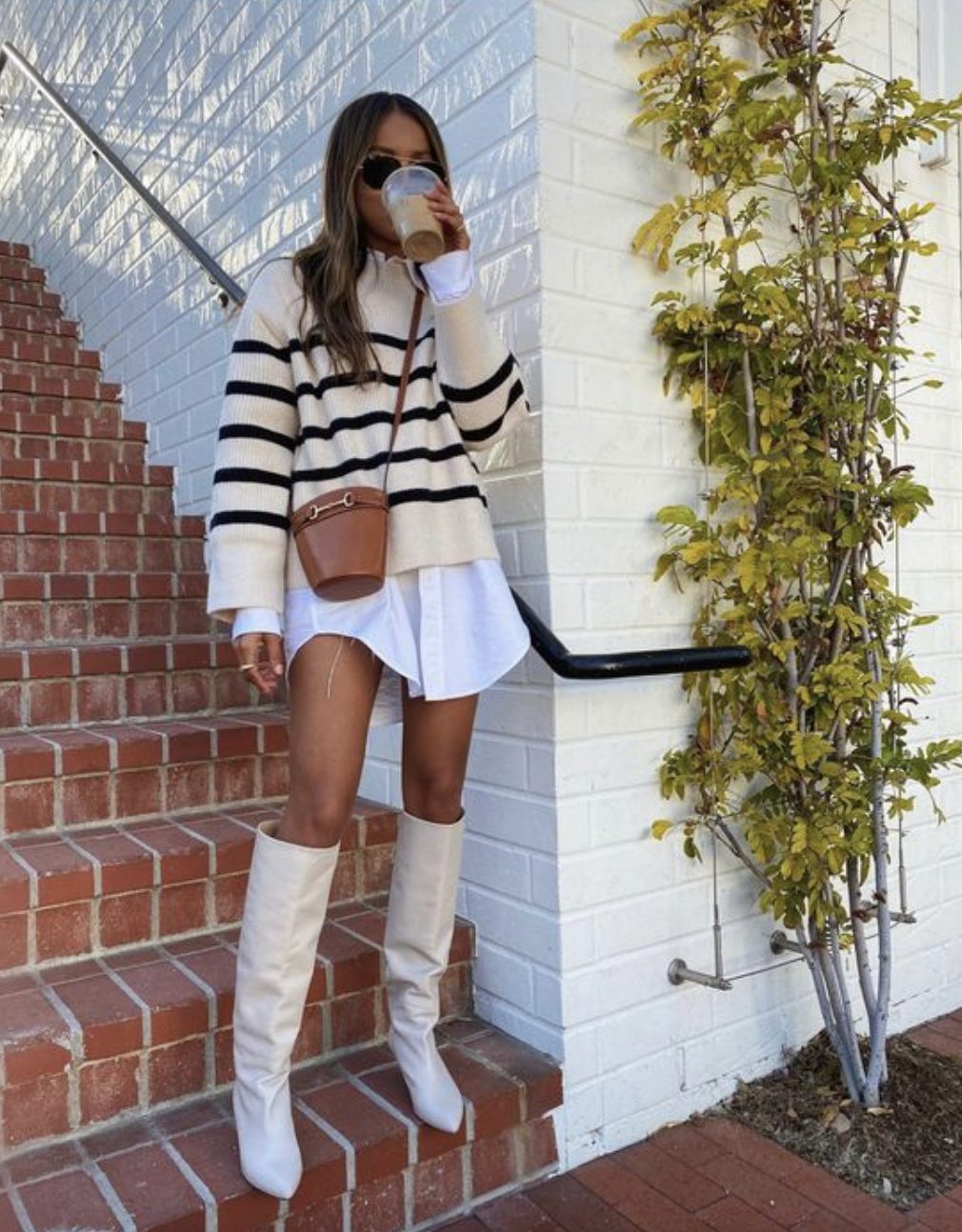 white shirt dress and striped sweater white shirt dress and striped sweater styled with tall white boots