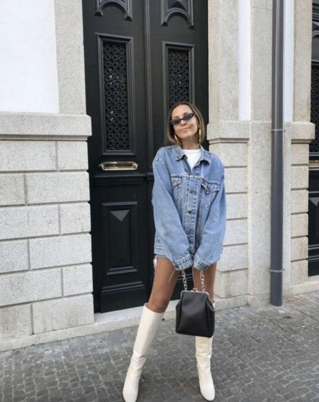 white boots with oversized denim jacket white boots with an oversized denim jacket