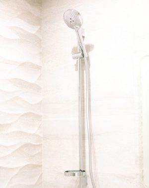 should you wash your face in the shower